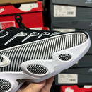 NOCTA x Nike Glide Preto e Branco